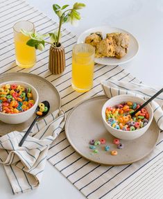 two plates with cereal and drinks on them