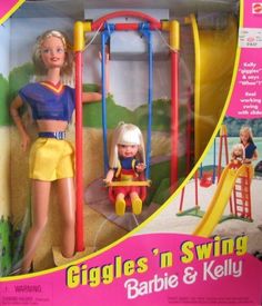 the barbie doll is playing with her baby in the swing and slide set, which also includes an infant's toy