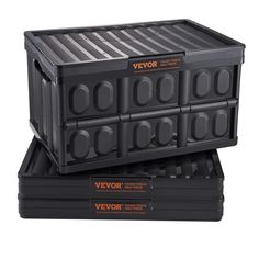 two black containers stacked on top of each other