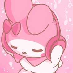 a pink hello kitty with headphones on