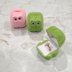 A cute frog ring box perfect to store a ring or small stud earrings Frog ring box comes in your choice of green or pink   Material: Velvet Flocked Ring Box Measurement Approx Width: 1.4in Height: 1.5in This listing is for 1 frog ring box (Ring in photo is for display only and not included in your order) Frog Ring, Silly Gifts, Gift Box Jewelry, Small Stud Earrings, Ring Boxes, I'm Broke, Earring Box, Box Ring, Cute Frog