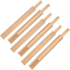 six pieces of wooden dows on a white background with one piece cut out and the other