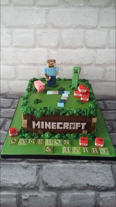 a cake made to look like a minecraft park