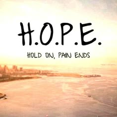 the words hope hold on pan ends are written in black ink over an image of a beach