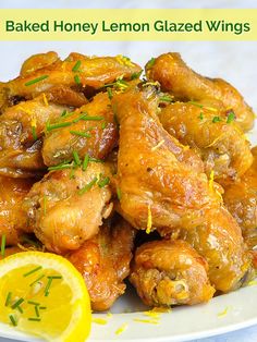 baked honey lemon glazed wings on a white plate