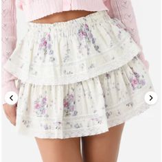 Brand New With Tags, Never Worn Smocked Waistband Tiered Silhouette Inset Lace Details All-Over Novelty Print 100% Cotton Slim Fit Model Is Wearing Size Small Skirt. Model's Measurements: Height: 5'9" | Bust: 32b | Waist: 24" | Hips: 36" | Dress Size: 2 (Us) Feminine White Skirt With Ruffle Hem, White Tiered Bottoms For Spring, Casual Tiered Bottoms With Lace Trim, White Feminine Skirt With Elastic Waistband, White Ruffle Hem Skirt For Daywear, Spring Bottoms With Lace Trim For Brunch, White Tiered Bottoms With Lace Trim, Spring Lace Trim Bottoms For Brunch, Feminine Lace Trim Bottoms For Brunch