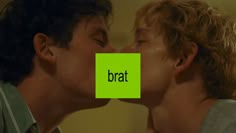 two people kissing each other with the words brat on them