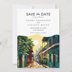 save the date card with an illustration of a city street