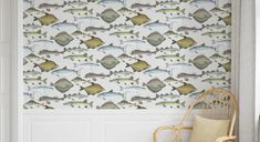 fish wallpaper in a room with a chair