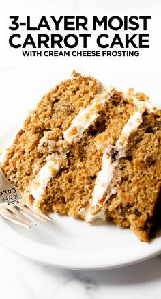 a piece of carrot cake with cream cheese frosting on a white plate next to a fork