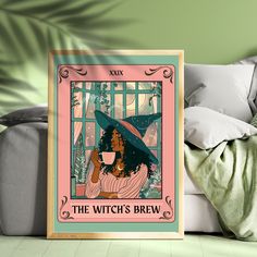 the witch's brew poster is displayed in front of a couch