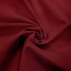 a close up shot of a red fabric