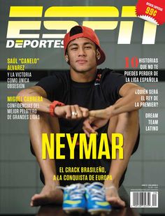 a man sitting on top of a wooden table next to a magazine with an image of him