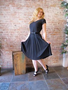 Excited to share this item from my #etsy shop: Vintage 1950s Black Pleated Dress - Rayon - Cocktail Dress - LBD - Little Black Dress - Scoop Back - Classic Fitted V-neck Vintage Dress, Black Retro Dress With Short Sleeves, Black Short Sleeve Dress For Vintage Fashion, Black Chic Dresses For Vintage Style, Black Short Sleeve Dress With Pleated Waist, Chic Black Vintage Fashion Dress, Classic Black Short Sleeve Vintage Dress, Classic Black Dress For Vintage Fashion, Black Pleated Dress