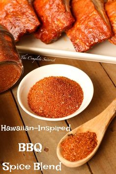 hawaiian - inspired bbq spice blend in a bowl next to ribs