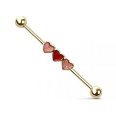 three hearts on a barbell ring in gold with pink and red glittered stones