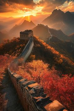 the great wall of china at sunset with mountains in the background