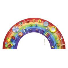 a rainbow shaped toy with lots of different items on it