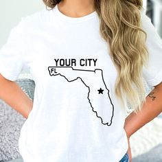 "Show your state pride with our custom home town shirts! (display in pictures is size M)  ~PLEASE READ ORDERING INSTRUCTIONS BEFORE PURCHASING~ T-shirt Info ->Crewnecks are 100% cotton and unisex sizes -> Tank Tops are Ladies Sizes and are 60% cotton and 40% polyester -> Long Sleeve Shirts are Unisex and 100% cotton -> Youth sizes are 100% cotton - tear away label - Design applied to shirt using HTV (Heat transfer vinyl) Do not iron over design HOW TO ORDER: 1. Review all photos and sizing chart Hometown Shirt Ideas, State Tshirts, Florida Vinyl Shirts, Florida Shirts, Florida State Sweatshirt, Florida State Seminoles Shirt, Florida Shirt, Florida Map, Shirt Display