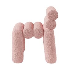 the letter m is made out of pink foam and has three balls attached to it