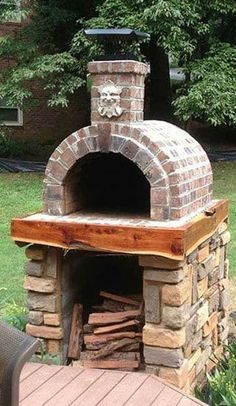 an outdoor brick oven with logs stacked in it