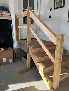 We finally got around to installing out railing in the garage. Garage Stair Railing, Garage Steps Into House With Landing, Garage Stairs Into House, Landing Railing, Garage Landing, Stair Platform, Mobile Home Patio, Garage Steps, Installing Exterior Door