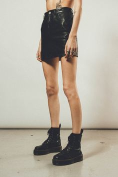 THE ULTRA MINI Skirt is crafted from 100% Leather in an ultra mini cut. Featuring 4 Pockets, Hidden button & clip fastening and a Silver zip fly. Finished with our signature Branded Scorpion button. Club Mini Skirt With Belt Loops, Edgy Leather Mini Skirt For Club, Edgy Leather Skirt For Club, Edgy Leather Skirt For Night Out, Mini Skirt With Belt Loops For Club, Black Leather Mini Bottoms, Fitted Leather Mini Skirt With Belt Loops, Spring Leather Mini Bottoms, Edgy Club Skort In Short Length