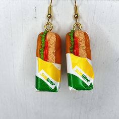 These adorable  sub earrings feed anyones hunger for fashion. Each sub dangles from a hypoallergenic hook earring. Each sub is approximately 1 1/4 inch tall by 1/2 inch wide  Please note these are not real food and they do have a little weight to them Wacky Earrings, Silly Earrings, Crazy Earrings, Tuna Sandwich, Book Earrings, Miniature Food Jewelry, Food Earrings, Funky Earrings, Food Jewelry