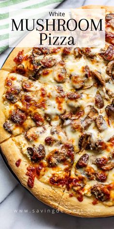 a white mushroom pizza sitting on top of a pan