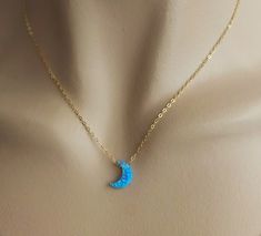 Shop Opal Necklace in gold.  You can wear this moon phase necklace with any style/color of your dress. It will add a perfect touch of blue color to your outfit. This layering blue moon is made from: - Lab created blue opal moon bead- 11 mm x 8 mm  - Gold filled chain - Gold filled lobster clasp - Gold filled jump ring Please select a desired length from the drop-down menu. Opal jewelry will make a great gift!  Opal is October birthstone. Your order of celestial jewelry will be mailed within 2 bu Blue Moon Necklace, Dainty Moon Necklace, Opal Moon Necklace, Opal Necklace Gold, Blue Opal Jewelry, Romantic Gifts For Wife, Gold Moon Necklace, Moon Phases Necklace, Celestial Jewelry