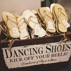 there are many pairs of shoes on display in the box that says dancing shoes when you're here