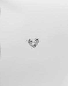 a drawing of a heart on the side of a white refrigerator freezer that is open