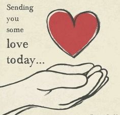 a hand holding a heart with the words sending you some love today