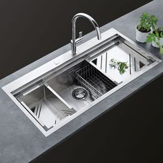 stainless steel sink with drainer and faucet in the middle, on black background