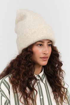 Embrace the colder seasons with the Carpenter Hat, a stylish oversized double layer beanie designed for ultimate comfort and warmth. Featuring a large fold-over brim, this modern cozy fit is perfect. Whether you're out for a stroll or enjoying time by a fire, the Carpenter Hat is your go-to companion for effortless style and snug warmth. Cozy Soft Knit Beige Bonnet, Cozy Beige Soft Knit Bonnet, Warm Snug Hats For Fall, Cozy Snug Hats For Fall, White Soft Knit Beanie For Fall, Cozy White Beanie For Everyday, Cozy Beige Bonnet For Fall, Cozy Soft Knit Bonnet For Fall, Beige One-size Hat For Cold Weather