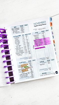 an open planner sitting on top of a table