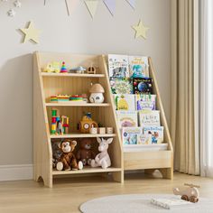 a child's bookshelf with stuffed animals and toys on the shelves in front of it