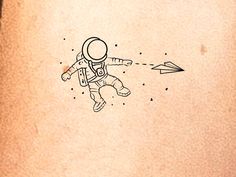 an astronaut is flying through the air with his arm extended and pointing at something in front of him