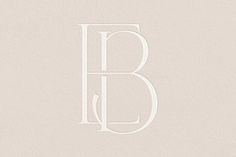 the letter b is shown in white on a beige background