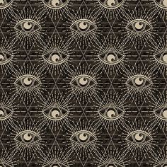 an all seeing eye pattern on black and white fabric with the sun shining through it