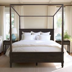 Indulge in sophistication with Martha Stewart's Kenna Canopy Bed—a queen-size masterpiece boasting a luscious dark wood finish that blends traditional allure with elegance. Crafted for enduring strength, effortless assembly, and an aura of opulence. Martha Stewart | Martha Stewart Kenna Canopy Bed Queen 80.0 H x 63.0 W x 86.5 D in brownWood in Dark Brown | 80" H X 63" W X 86.5" L | Wayfair Canopy Bed Queen, King Canopy Bed, Queen Size Canopy Bed, Wooden Canopy Bed, Wood Canopy Bed, Queen Canopy Bed, Wood Canopy, Barn Renovation, Canopy Beds