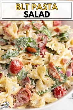 a bowl filled with pasta salad on top of a table