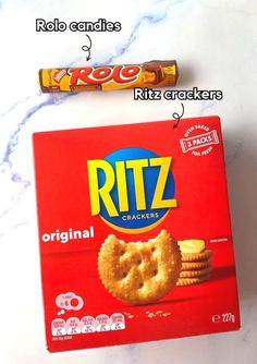 a box of ritz crackers next to a candy bar