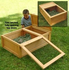 two children are playing in the grass with their raised garden boxes and one boy is looking at them