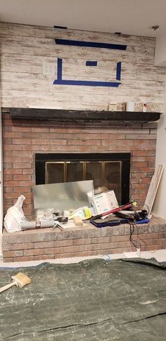 the fireplace is being remodeled and ready to be used as a living room or office