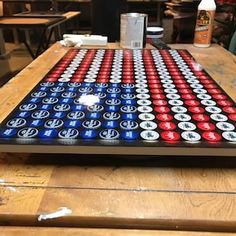 a long table with many different colored buttons on it