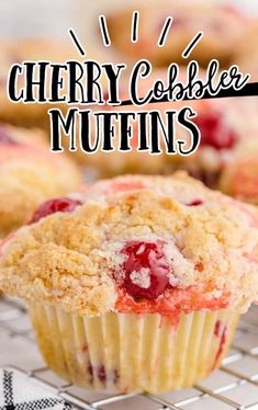 a close up of a muffin on a cooling rack with the words cherry cobbler muffins above it