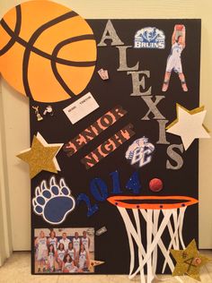 a basketball themed bulletin board with sports related items