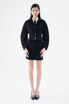 Crafted with a classic A-line shape and a luxurious wool blend, this skirt offers perfect warmth and timeless sophistication to any wardrobe. Look and feel your best with this must-have piece! Length: 40cm/41cm/42cm (S/M/L) Flared Skirt For Workwear In Fall, Formal Pencil Skirt Suit For Fall, Chic Fitted Wool Pencil Skirt, Classic Wool Mini Skirt For Work, Classic Fall Skirt For Business Casual, Spring Formal Wool Skirt, Formal Wool Skirt For Spring, Formal Spring Wool Skirt, Classic Lined Mini Skirt For Fall