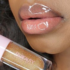 Sparkle Beauty This lip gloss is absolutely beautiful in person Vanilla scent daily shimmer lip gloss that is glossy long lasting, non-sticky, will give you soft lips and a moisturizing experience giving your lips just right amount of sparkle Ingredients: Vitamin E Oil, Apricot Oil, Grapeseed Oil, Hydrogenated Polyisobutene, Vegan Gloss Base and Cosmetic flavor oil Vanilla scented Big applicator wand tube Vanilla Makeup, Shimmer Lip Gloss, Prom Makeup Looks, Apricot Oil, Flavored Oils, Beauty Make-up, Lip Hydration, Vitamin E Oil, Soft Lips